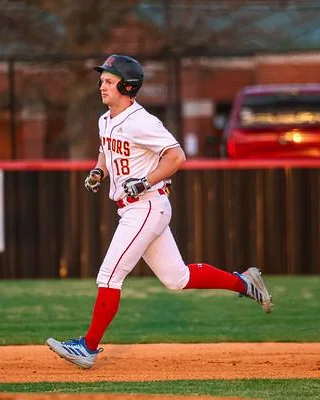 Michael Holt running the bases during a baseball game